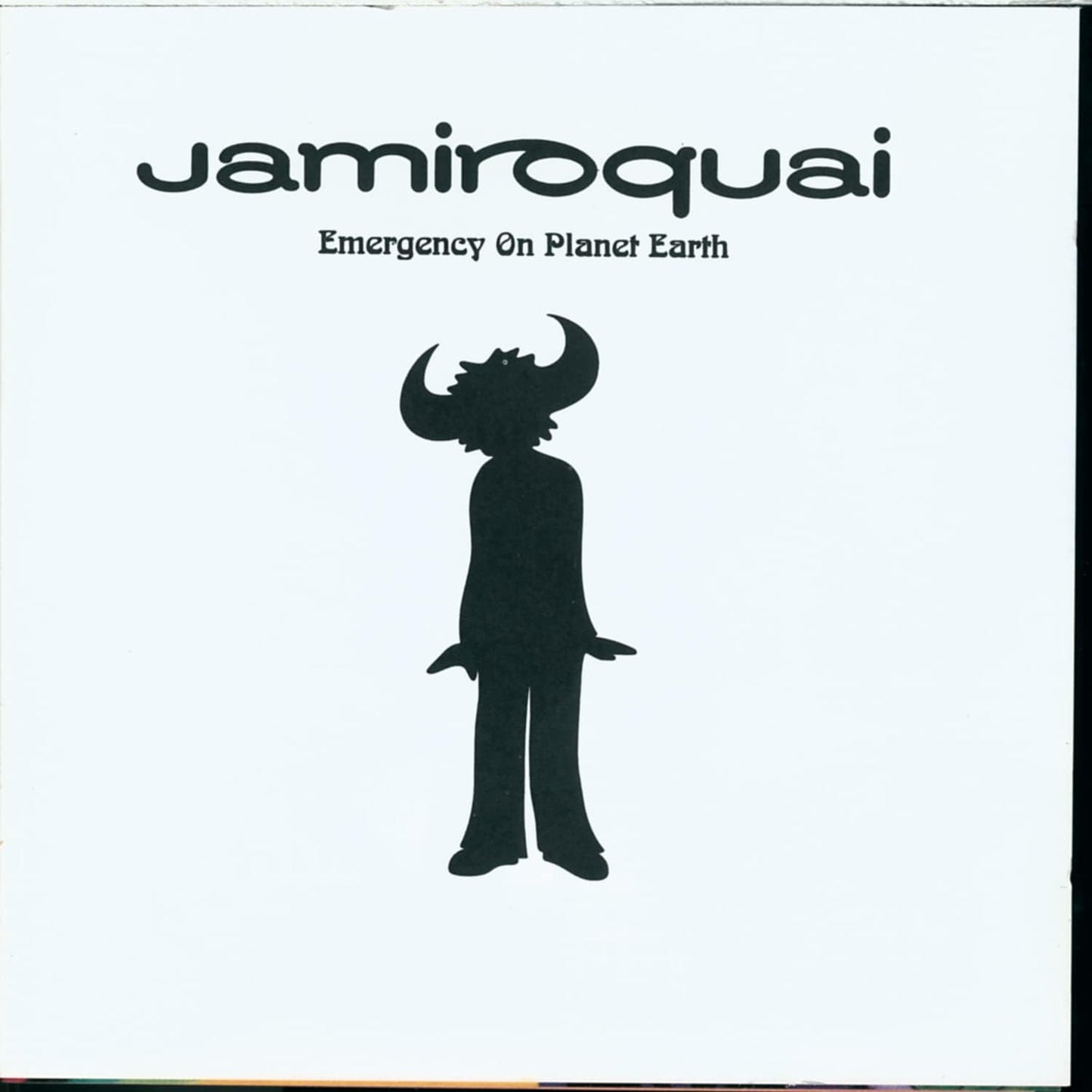 Album cover of 'Emergency On Planet Earth' by Jamiroquai with a silhouette of a person wearing a hat on a white background.