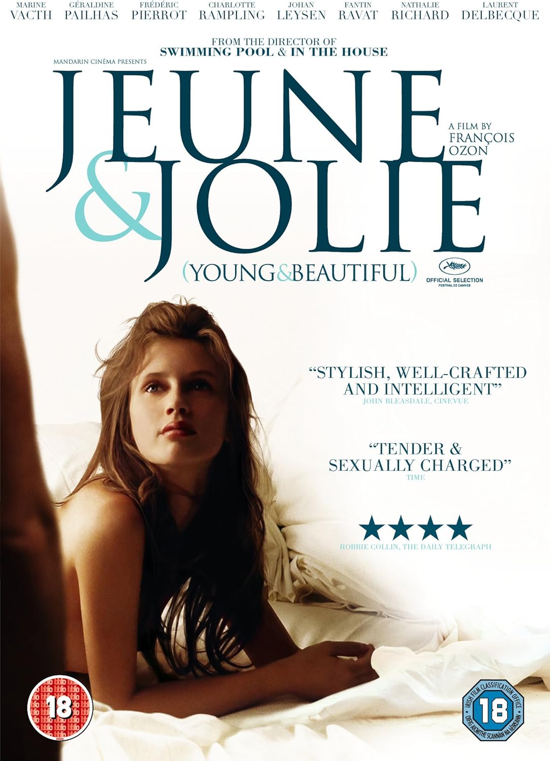 Movie poster for the film 'Jeune & Jolie' (Young & Beautiful) featuring a woman lying on a bed, with large title text at the top and rating badges in the bottom corners.