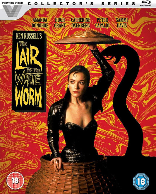 The Lair of the White Worm collector's series Blu-ray cover featuring Ken Russell's film artwork, with a woman in a black dress holding a tray over her head and a large black snake silhouette against a red and yellow swirling background. Vestron Video branding and age rating logos are visible.