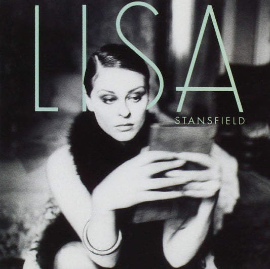 Black and white album cover with a person holding a glass, featuring the name 'Lisa Stansfield'.