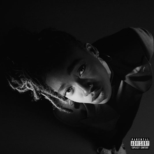 Black and white album cover with a person and 'Parental Advisory' label.