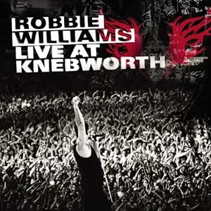 Album cover for Robbie Williams' 'Live at Knebworth' featuring a black and white photo of a crowd with a raised hand, bold white title text, and a red graphic in the upper right.