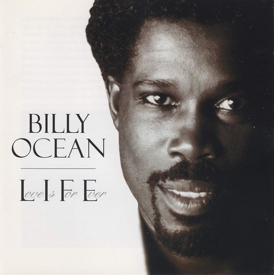 Album cover for Billy Ocean's 'Love Is For Ever', featuring a close-up black and white portrait of the artist on the right and the title text on the left.