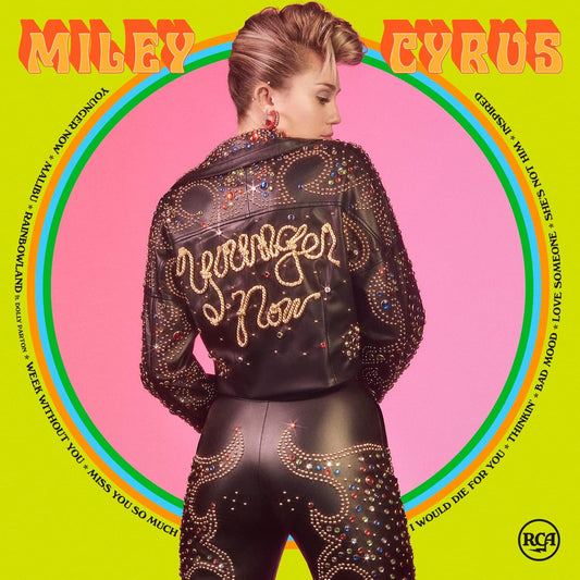 Album cover with a person wearing a studded jacket, colorful text, and RCA logo.