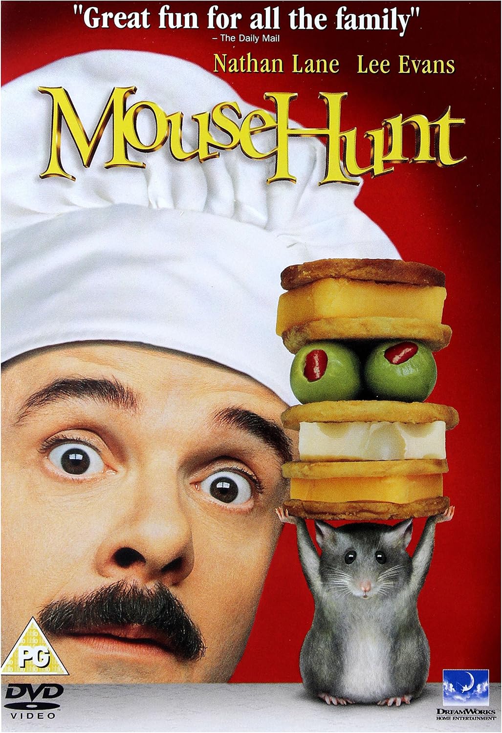 DVD cover for the movie 'Mouse Hunt' featuring a close-up of a man's face wearing a white chef's hat on the left, and a small gray mouse carrying a stacked sandwich on its head against a red background. The title 'Mouse Hunt' is displayed in large yellow letters at the top.