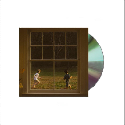 Two children playing in a field as seen through a window, with a CD on a white background.
