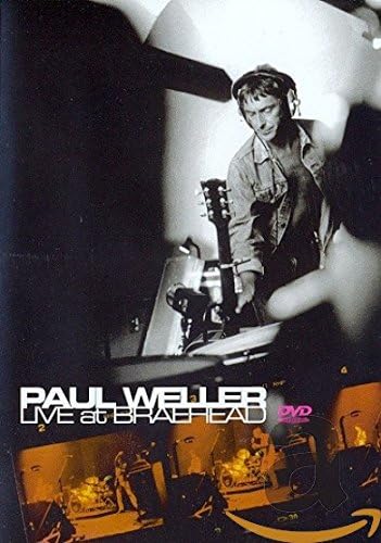 DVD cover of 'Live at Braehead' featuring Paul Weller with a black and white photo of a person playing guitar.