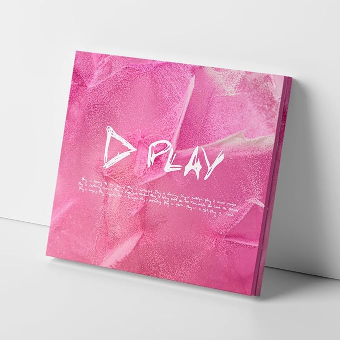 Pink album cover with 'PLAY' text and design on a white background