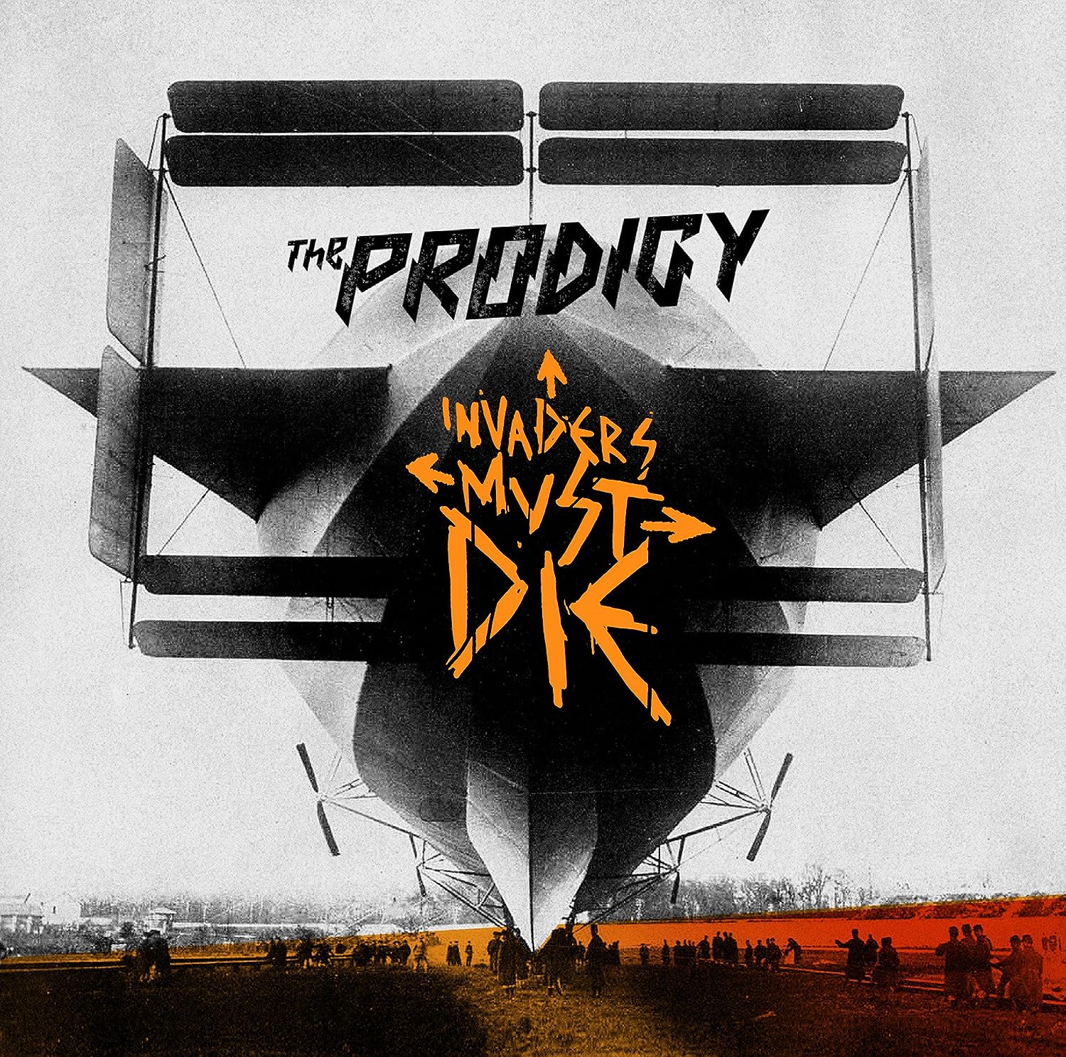 The cover art features a black and white photograph of an old-fashioned airplane with the text 'THE PRODIGY INVADERS MUST DIE' and the band's logo in orange.