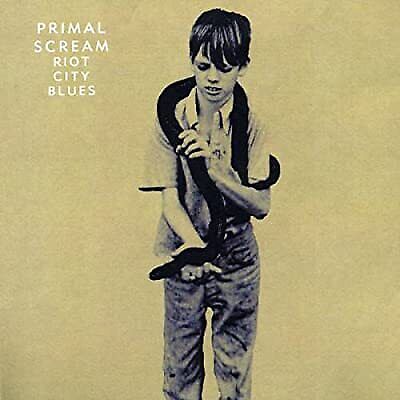 Audio CD cover of Primal Scream's 'Riot City Blues' featuring a black and white image of a boy holding a snake.