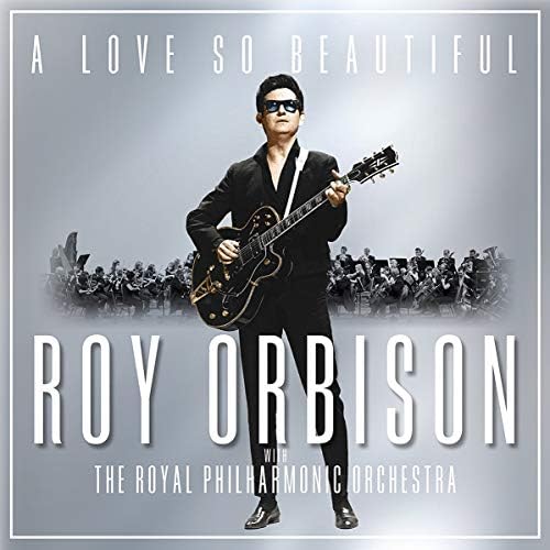Album cover featuring Roy Orbison with a guitar, set against a gray background with text 'A Love So Beautiful' and 'Roy Orbison with The Royal Philharmonic Orchestra'.