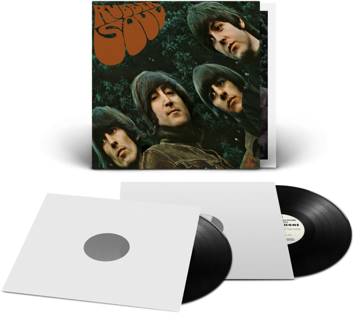 Rubber Soul vinyl record album shown with the illustrated outer cover standing upright, plus two black LP records partially pulled from white inner sleeves on a clean white background.