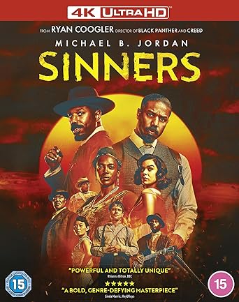 Movie poster for 'Sinners' featuring a group of people with a sunset background.