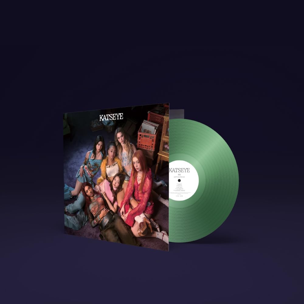 Kansye 'The Truth' vinyl record album shown with the illustrated sleeve and a translucent mint green vinyl disc on a dark navy background.