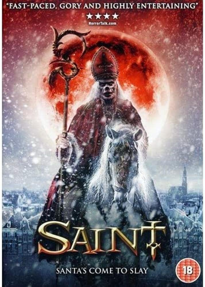 Movie poster for the horror film 'Saint' featuring a robed saint-like figure on a white horse against a large red moon and snowy cityscape. The title 'SAINT' appears in large gold letters at the bottom, with a HorrorTalk.