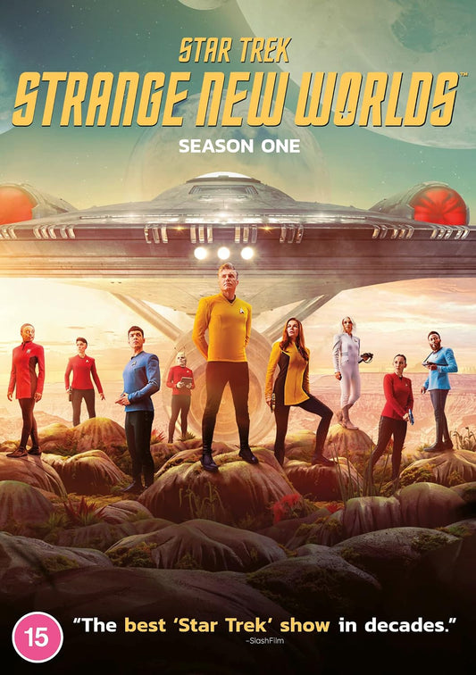 Promotional poster art for Star Trek: Strange New Worlds Season One, showing the main cast standing on a rocky alien landscape beneath a large spaceship, with the title text at the top and a quote at the bottom.