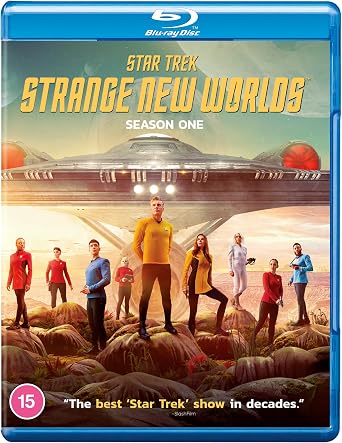 Star Trek: Strange New Worlds Season One Blu-ray cover featuring the main cast standing in a desert landscape with a large spaceship overhead, on a blue Blu-ray case.
