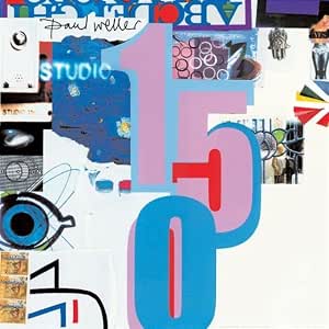 Album cover for Paul Weller's 'Studio 501' featuring a colorful collage design with large pink and blue numbers, a blue eye illustration, and various small graphic elements on a white background.