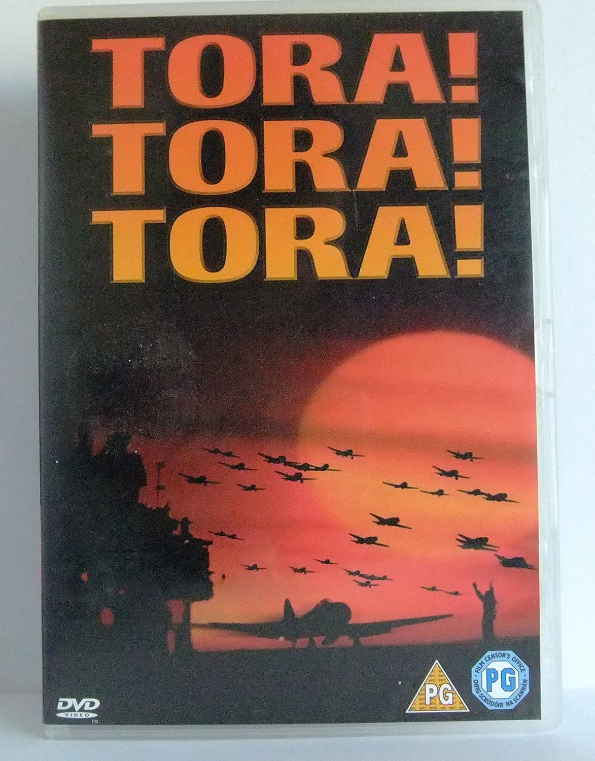 DVD cover of 'Tora! Tora! Tora!' with airplane silhouettes and sunset design.