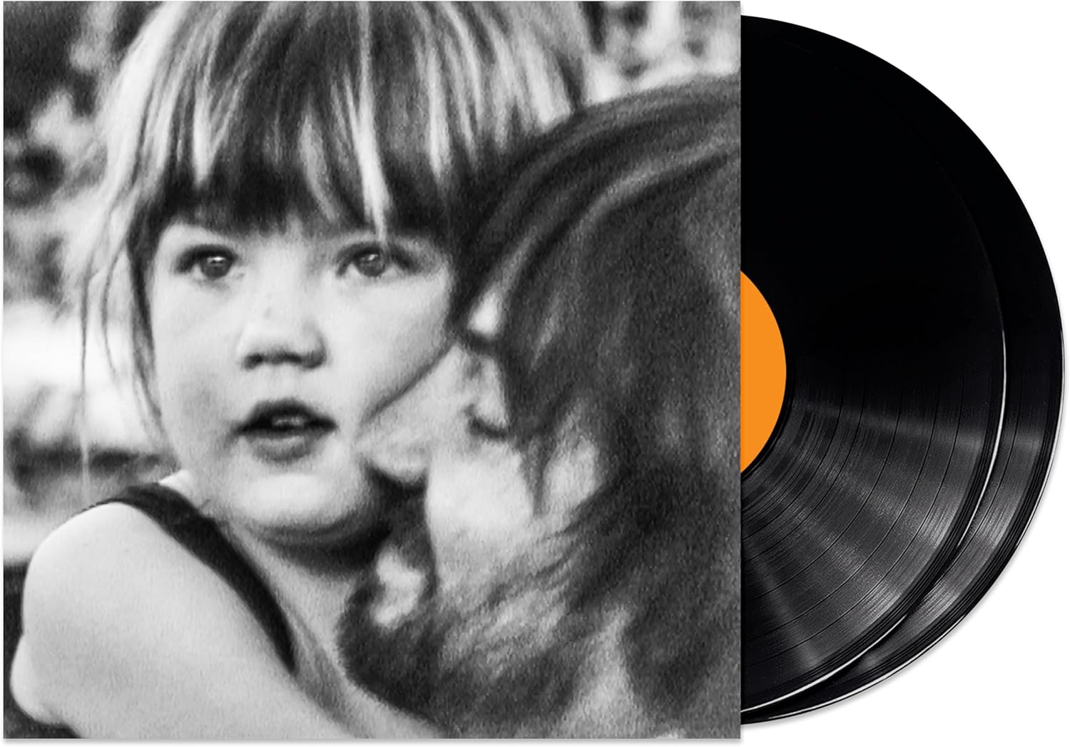 Vinyl record with a black and white photo of a child on the cover