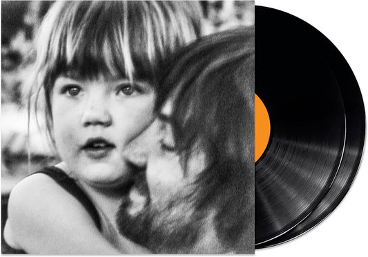 Vinyl record with a black and white photo of a child on the cover