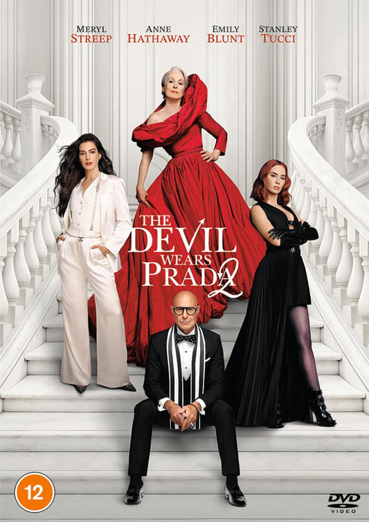 The Devil Wears Prada 2 DVD movie cover featuring Meryl Streep, Anne Hathaway, Emily Blunt, and Stanley Tucci posing on white stairs. Meryl Streep is in a large red gown, Anne Hathaway is in a white pantsuit, Emily Blunt is in a black dress, and Stanley Tucci is seated in a black tuxedo.