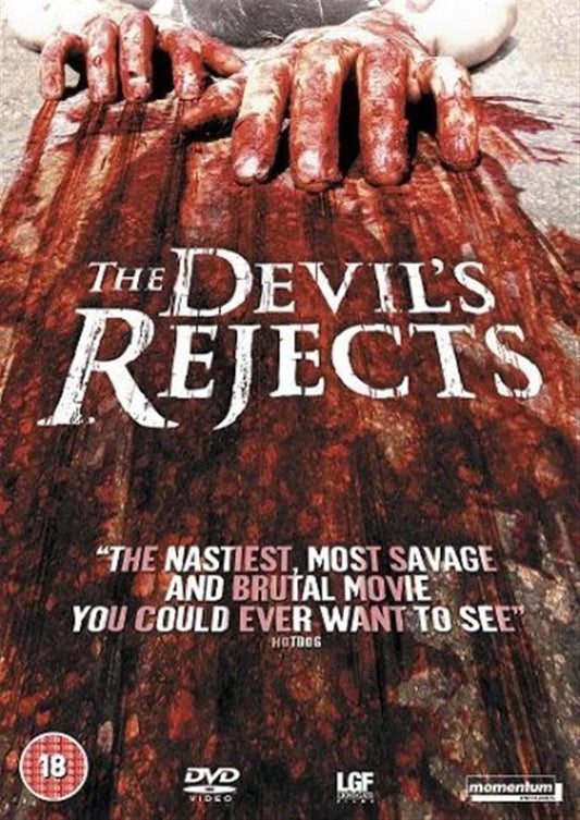 DVD cover for the horror movie 'The Devil's Rejects' featuring a bloody, distressed dress with a pair of hands gripping the top edge. The title is displayed in large white distressed text, with a review quote below and DVD logo and studio names at the bottom.