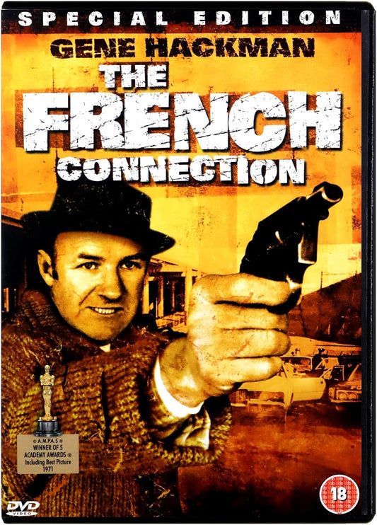 DVD cover for Gene Hackman's 'The French Connection' Special Edition, featuring a sepia-toned western design with the title in large distressed white letters and a portrait of Gene Hackman holding a gun.