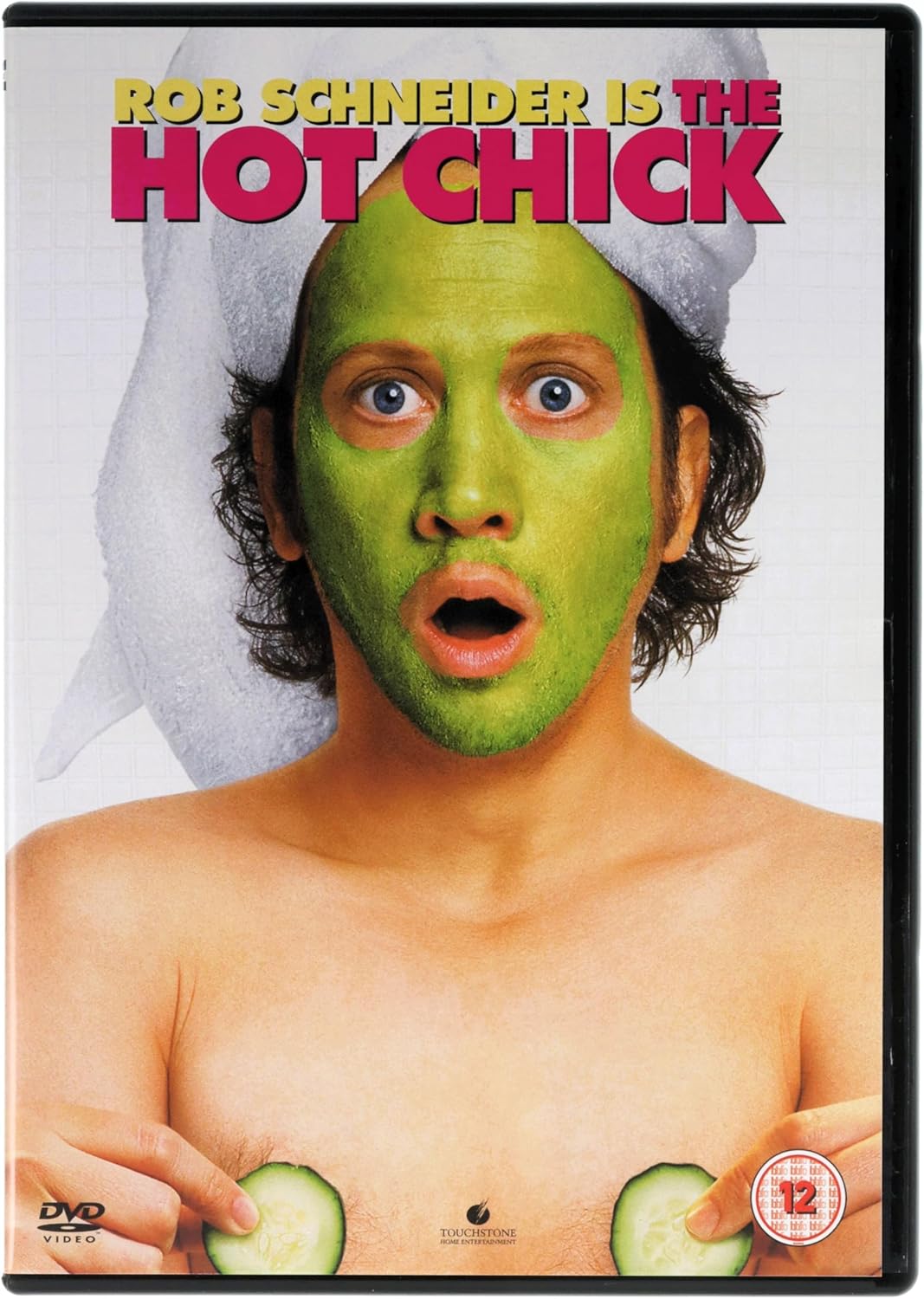 DVD cover for Rob Schneider's 'The Hot Chick' featuring a shirtless man with a green face mask and white towel wrapped around his hair, holding cucumber slices, with the title text at the top.