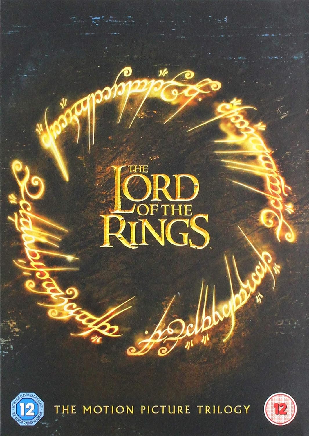 The Lord of the Rings: The Motion Picture Trilogy DVD cover, featuring the Elvish ring script forming a circle around the title in gold on a dark textured background, with age rating badges at the bottom.