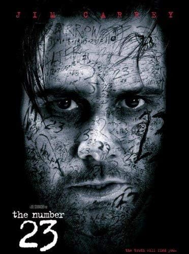 Movie poster for 'The Number 23' featuring a close-up portrait of Jim Carrey with handwritten numbers and symbols across his face, on a black background with the title at the bottom.