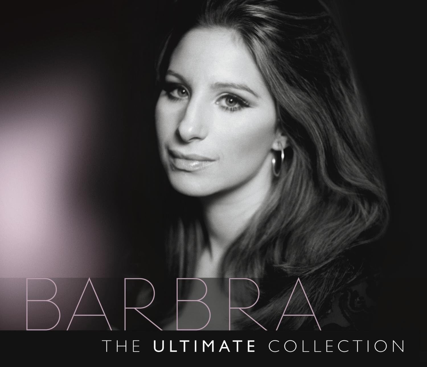 Black and white portrait of a woman with 'Barbra: The Ultimate Collection' text.
