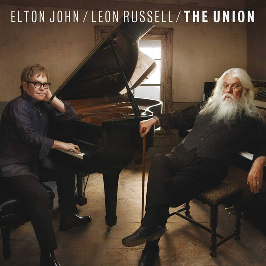 Two men sitting at a piano with the album title 'The Union' above them.