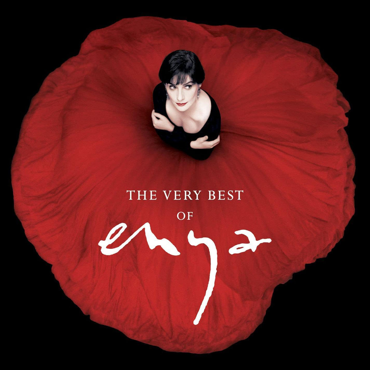 Album cover with a person in a large red dress and 'The Very Best of Enya' text on a black background