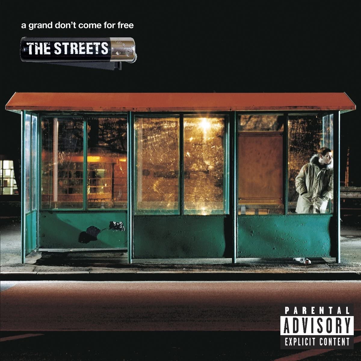 Album cover for The Streets' 'A Grand Don't Come For Free' featuring a man sitting on a green bench at night.