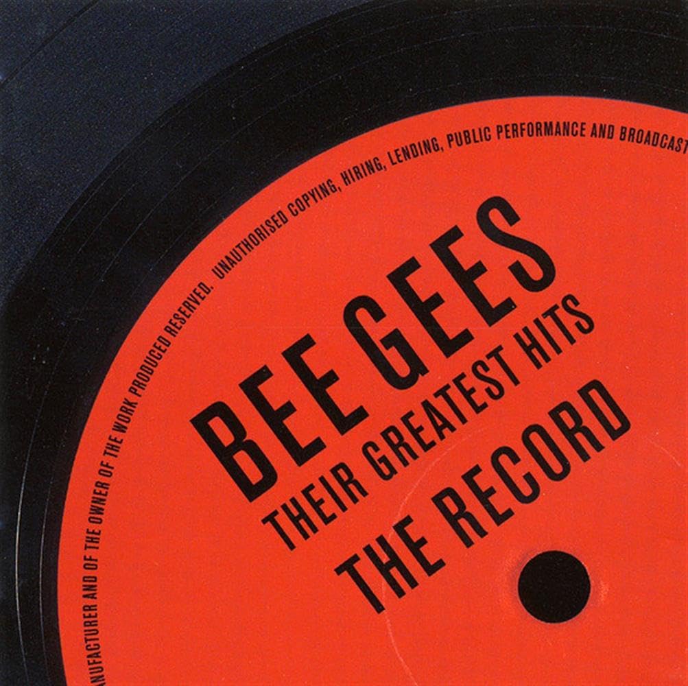 Vinyl record with 'Bee Gees Their Greatest Hits' text on an orange label