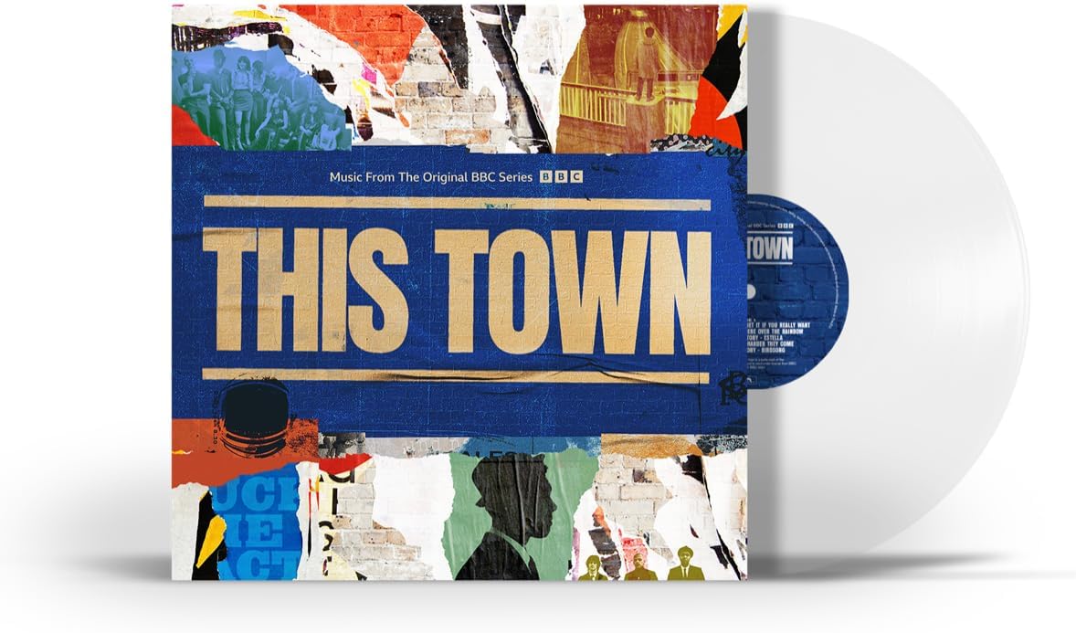 This Town vinyl record album with a white translucent disc partially pulled from a square album sleeve. The sleeve features a collage-style design with a large blue central panel and the title 'THIS TOWN' in beige text.