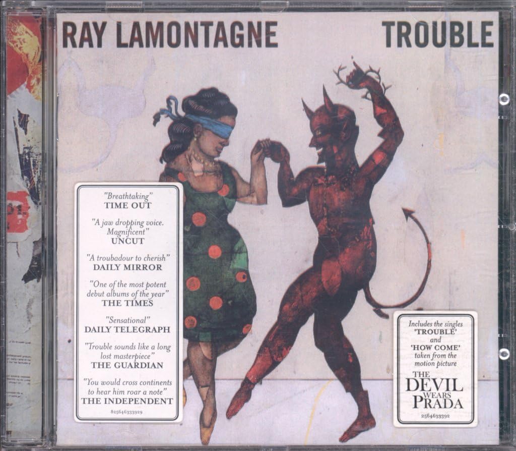 CD cover of Ray Lamontagne's 'Trouble' with artistic depiction of a woman and devil figure.