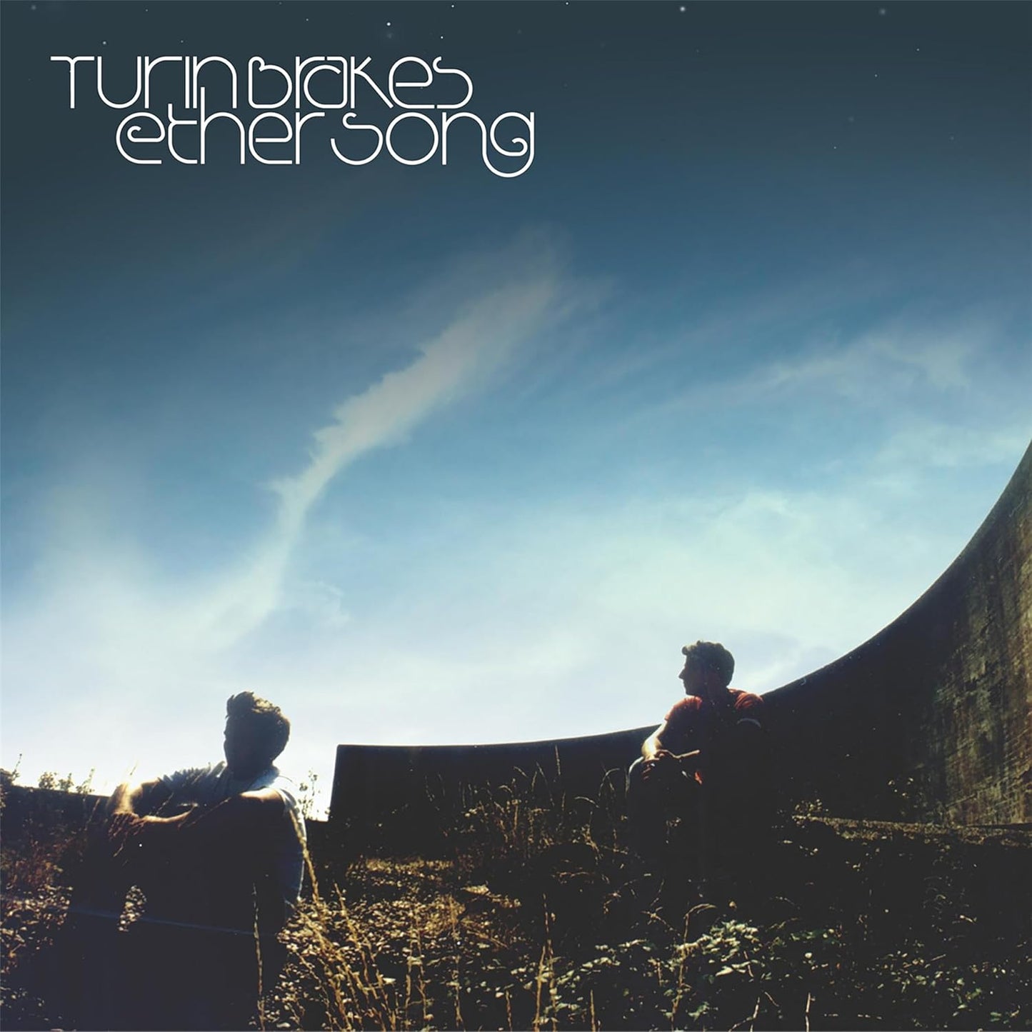 Album cover with two silhouettes sitting on a bench under a blue sky with a rainbow, featuring the text 'Turin Blake's Ethersong'.