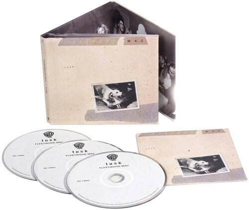 Fleetwood Mac 'Tusk' album with CD and photo sleeve on a white background