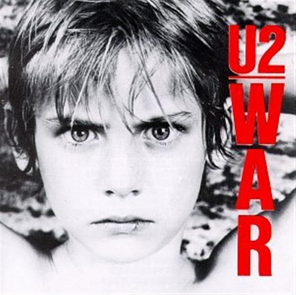 Album cover for U2's 'War' featuring a black and white portrait with red text.