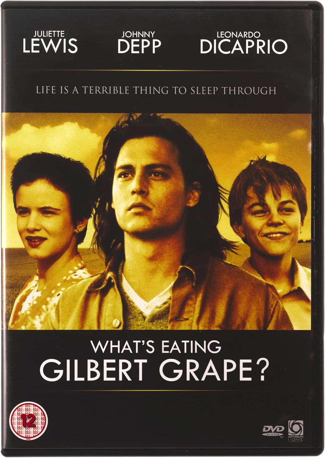 DVD cover for the movie 'What's Eating Gilbert Grape?' featuring a black background with the cast's names at the top, a central film still with a warm yellow-tinted portrait photo of three characters, and the title in large white text near the bottom.