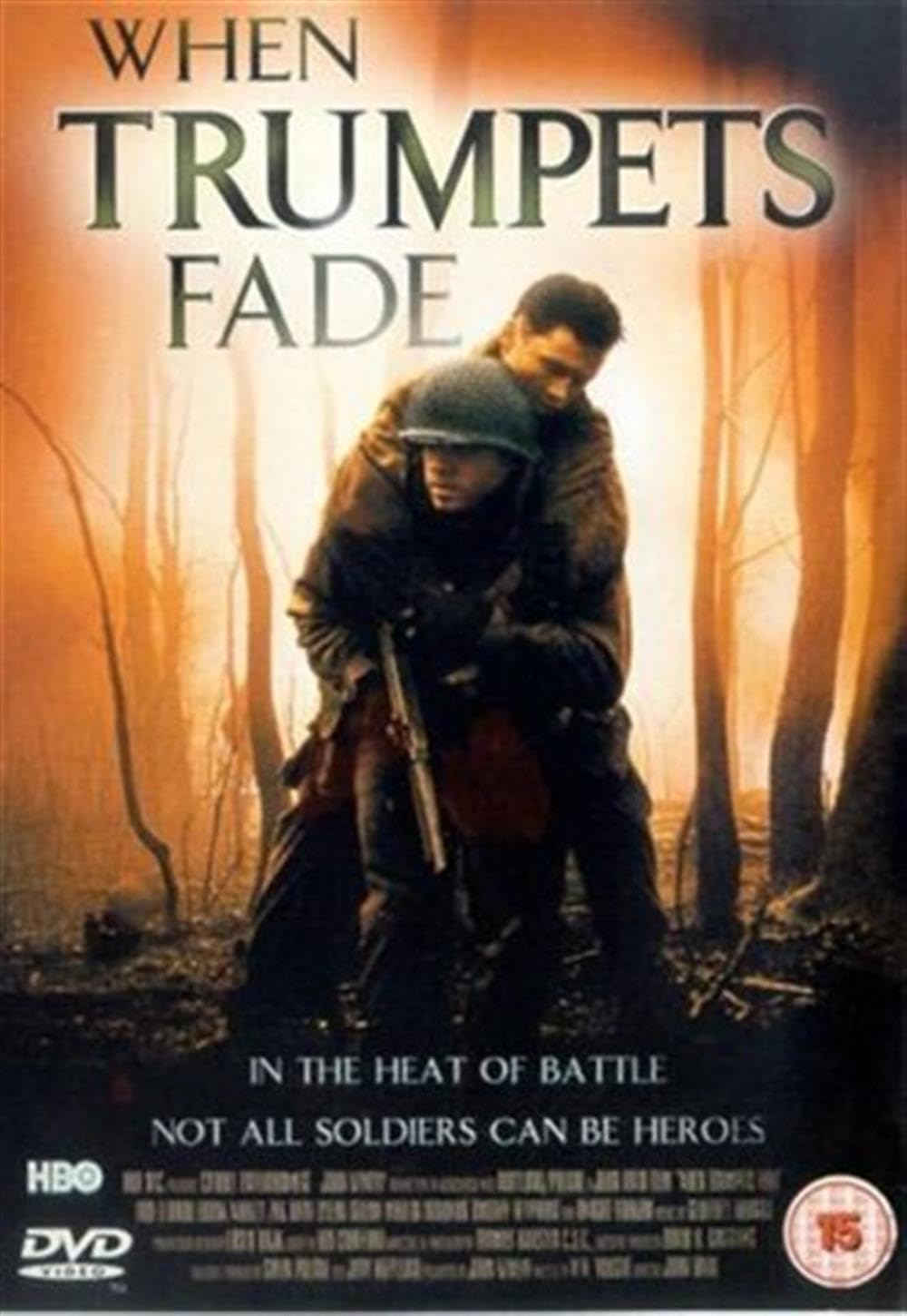 Movie poster for 'When Trumpets Fade' featuring two soldiers in a forest setting.