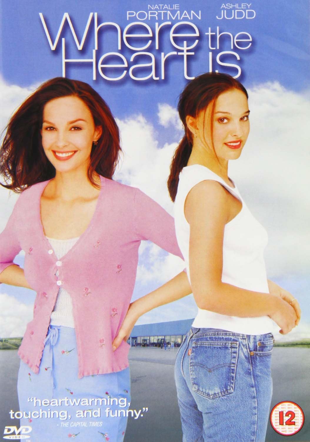 DVD cover for the movie 'Where the Heart Is' featuring Natalie Portman and Ashley Judd against a blue sky and clouds background, with the title at the top and a DVD logo at the bottom left.