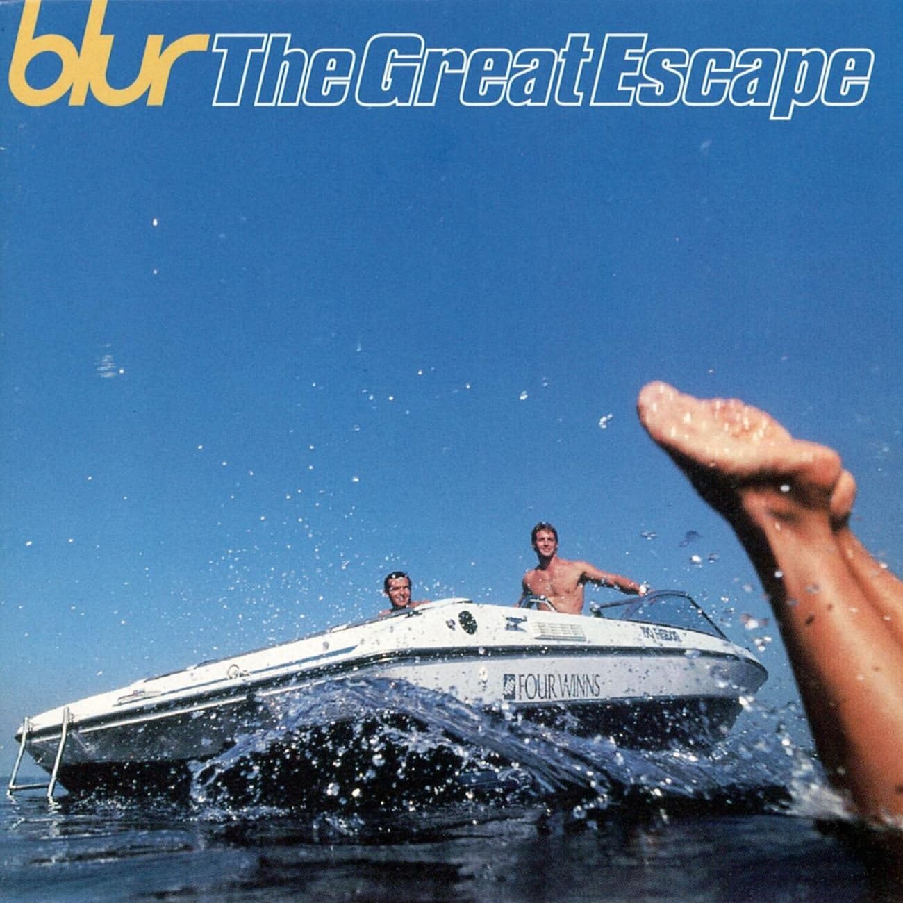 Album cover of 'The Great Escape' by Blur with two people on a speedboat.