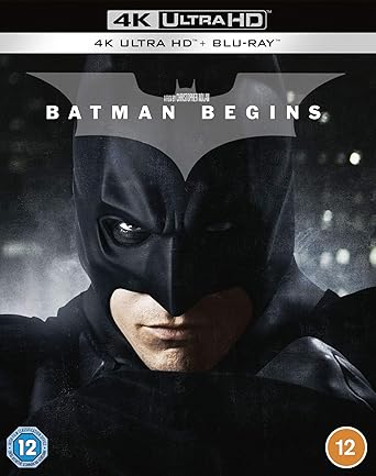 Batman Begins 4K Ultra HD + Blu-ray cover with Batman's face and logo.