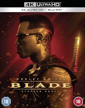 Blade movie cover with a character in profile, sunglasses, and a red background.