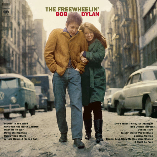 The product image shows the cover of the vinyl album 'The Freewheelin' Bob Dylan' featuring Bob Dylan and a woman walking down a street, with a colorful backdrop of buildings and a car.