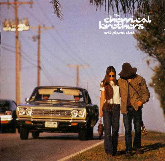 The cover image shows the album 'Exit Planet Dust' by The Chemical Brothers. It features a man and a woman standing by a car, with the album title and the band's name at the top.