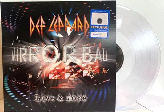A vinyl record with a clear disc and a cover featuring Def Leppard and the text 'Mirror Ball Live & More'. The cover displays the band on stage with a vibrant backdrop.